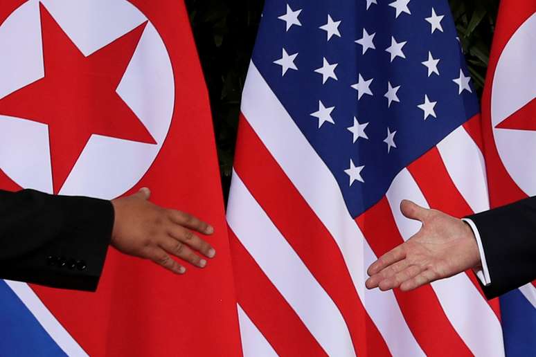 O presidente dos Estados Unidos, Donald Trump, e o líder norte-coreano Kim Jong Un durante cúpula em Singapura
12/06/2018
REUTERS/Jonathan Ernst 