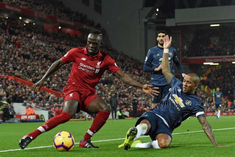 No jogo do turno, o Liverpool venceu o United por 3 a 1 (Foto: AFP)