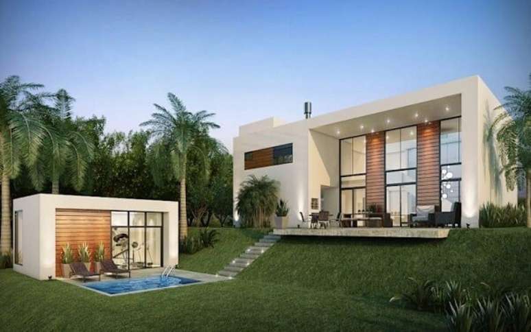 6-O telhado embutido &eacute; muito utilizado em casas com arquitetura Moderna. Fonte: Pinterest