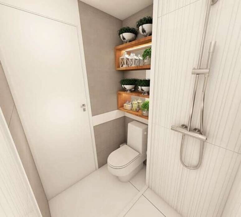 22- Na decora&ccedil;&atilde;o de casas pequenas, os nichos no banheiro acomodam perfumes e outros produtos de higiene pessoal. Fonte: Patricia Aguiar & Gustavo Petinati