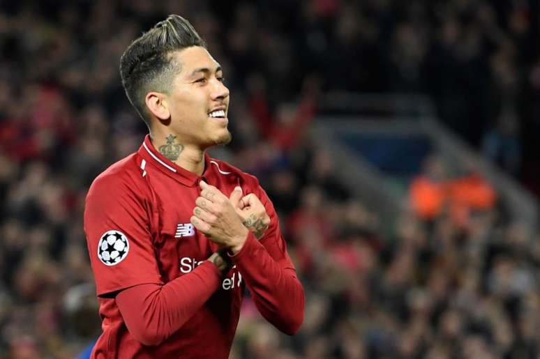 Firmino marcou o segundo gol do Liverpool nesta terça contra o Porto (Foto: LLUIS GENE/AFP)