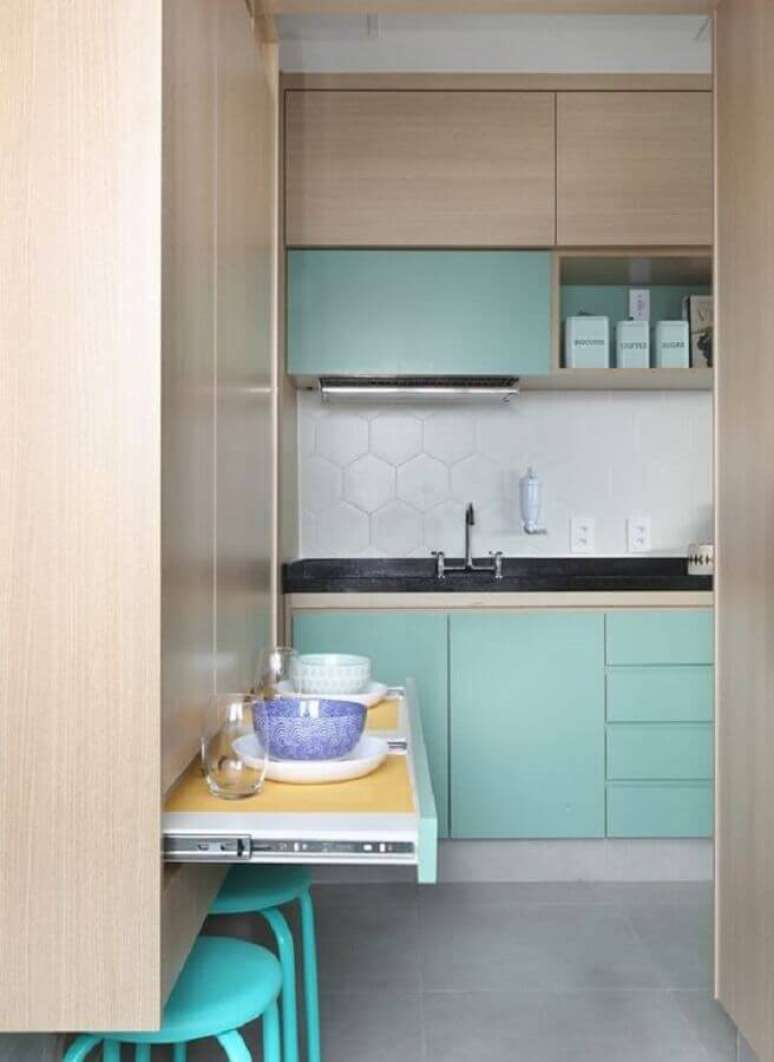 10. Decoração clean com armário verde água para cozinha planejada – Foto: Pinosy