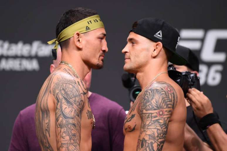 Max Holloway e Dustin Porier disputam o cinturão interino dos leves neste sábado (13) no UFC (Foto: Getty Images)