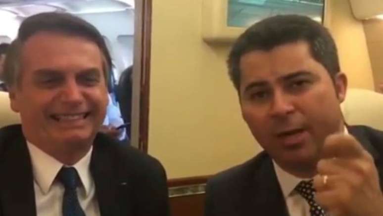 O presidente Jair Bolsonaro e o senador Marcos Rogério, em vídeo reproduzido nas redes sociais