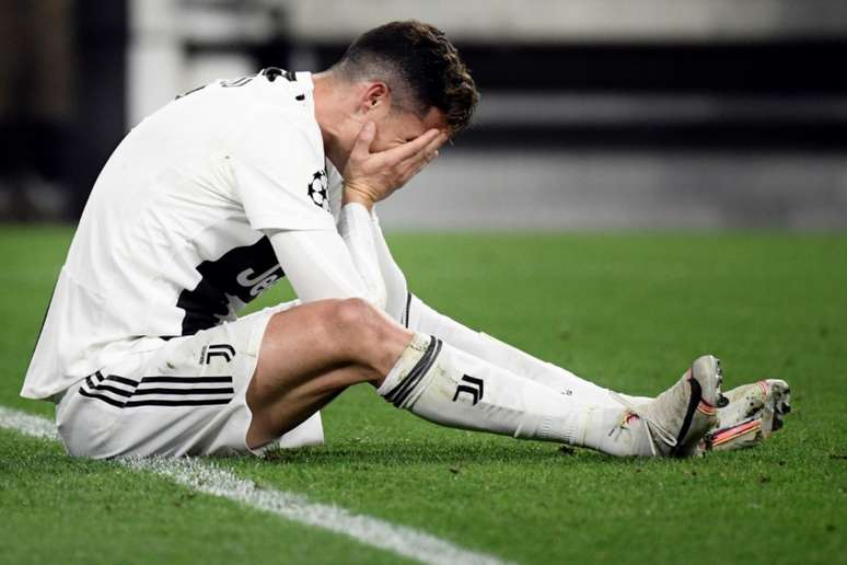 CR7 abriu o placar, mas a Juventus levou a virada e foi eliminada (Foto: Filippo MONTEFORTE/AFP)