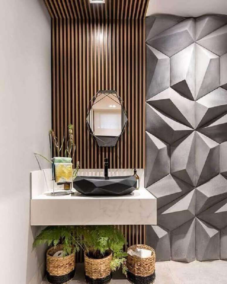60. Decoração moderna para lavabo com revestimento 3D, cuba diferente e espelho geométrico – Foto: Zozu