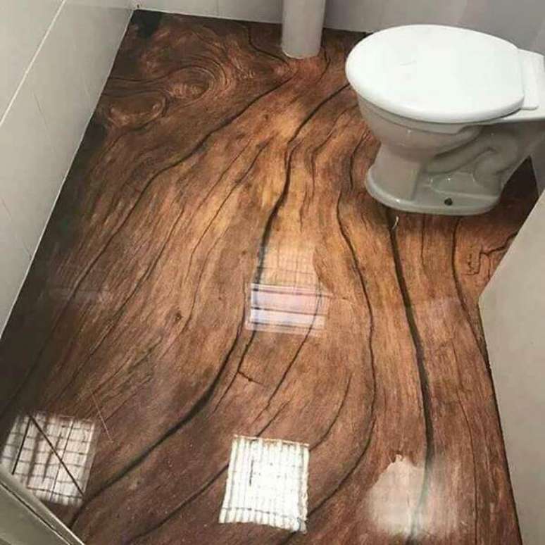 28 &ndash; Piso 3D com efeito amadeirado aplicado no banheiro. Fonte: Pinterest