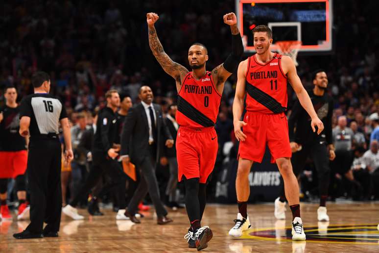 Damian Lillard comemora a vitória do Portland Trail Blazers sobre o Denver Nuggets