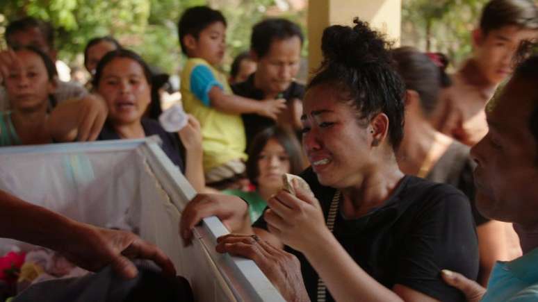 Lom, uma ex-prostituta, teve que voltar para cuidar da família na Tailândia