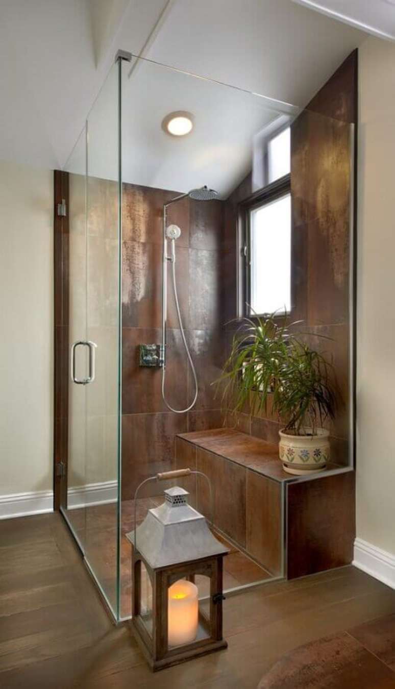 22. Banheiro decorado com box de vidro e porcelanato a&ccedil;o corten &ndash; Foto: Yelp