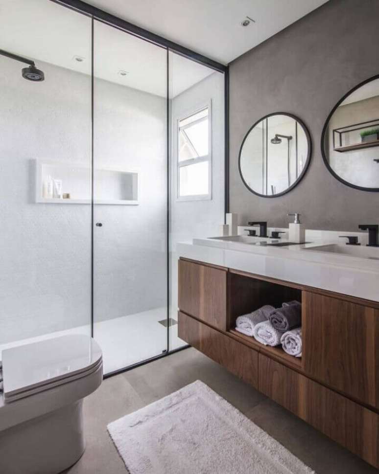 11. O banheiro moderno também pode receber dois espelhos redondos na sua decoração – Foto: CONECTARQ