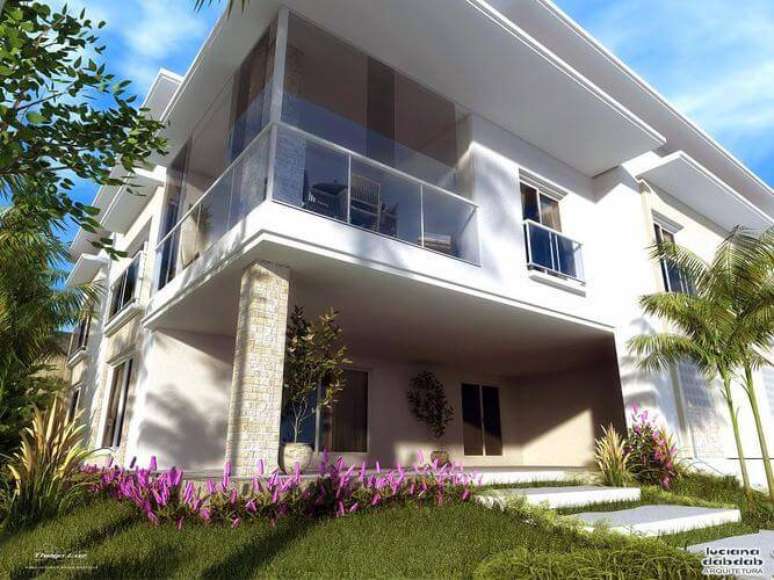 11. O modelo de casa tipo sobrado é muito elegante e marcante. Projeto por Thiago Luz