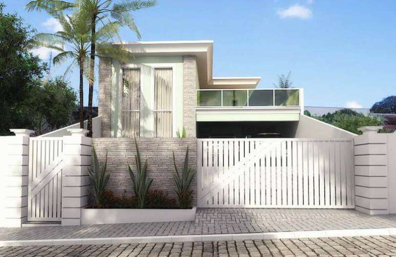 15. Uma casa com uma fachada clara pode ser bonita e elegante. Projeto por Neuza Brito