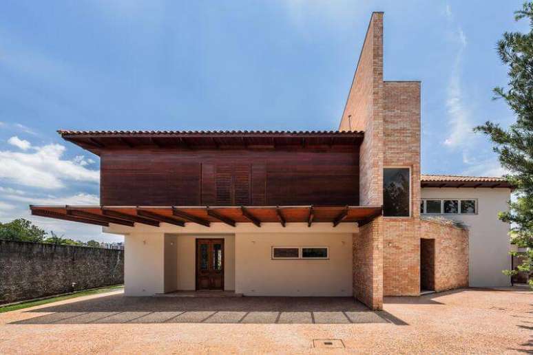 31. Casa bonita que une referências rústicas e modernas. Projeto por Antonio Ferreira e Mario Celso Bernardes