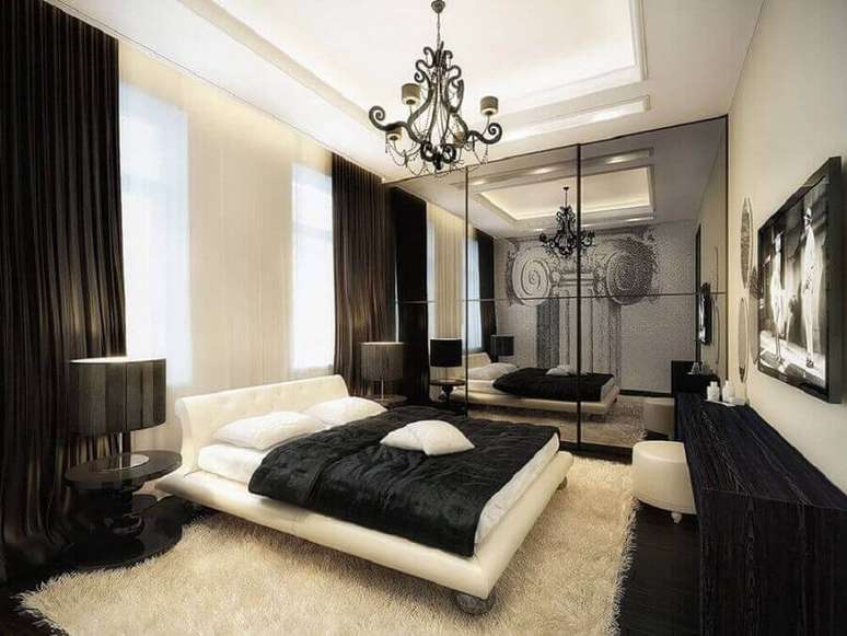24. Decoração preta e branca com lindo lustres para quarto moderno