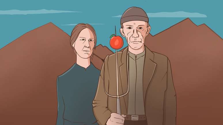 A man and a woman stand with an apple on the end of a knife