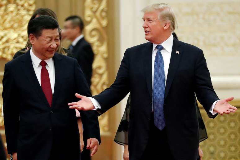 Os presidentes da China, Xi Jinping (à esquerda), e dos EUA, Donald Trump. 09/11/2017. /Jonathan Ernst