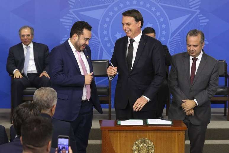 Bolsonaro durante cerimônia em que assinou nova legislação para prevenir fraudes no INSS 