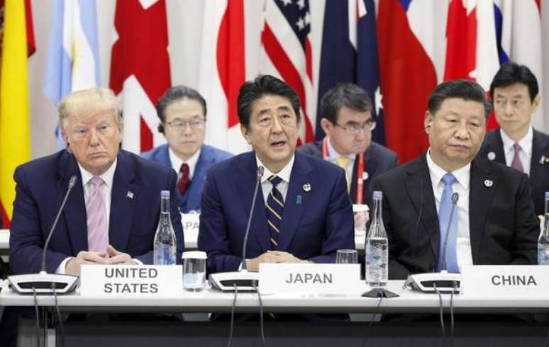 Donald Trump, Shinzo Abe e Xi Jinping durante cúpula do G20 em Osaka