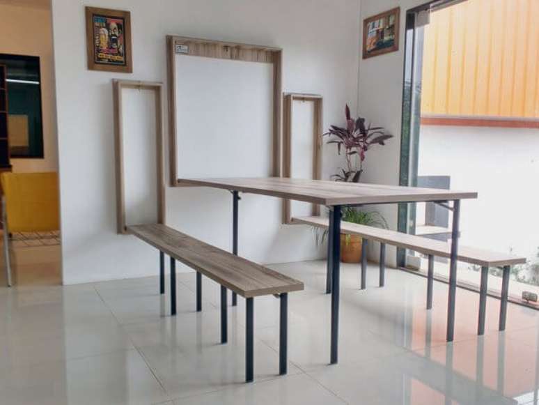 35. Mesa dobr&aacute;vel de parede no lugar da mesa de jantar