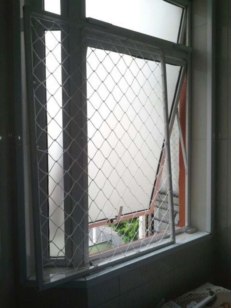 18. Algumas janelas são mais difíceis de instalar redes de proteção. Foto: Redes de Proteção