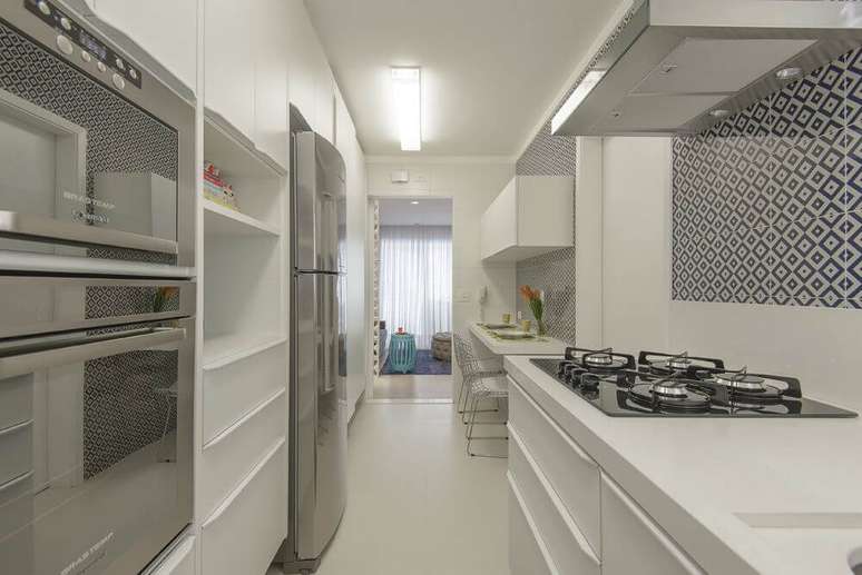 9. O cômodo pode ficar luxuosa com certos tipos de eletrodomésticos para cozinha. Projeto por: D2N Arquitetura + Interiores