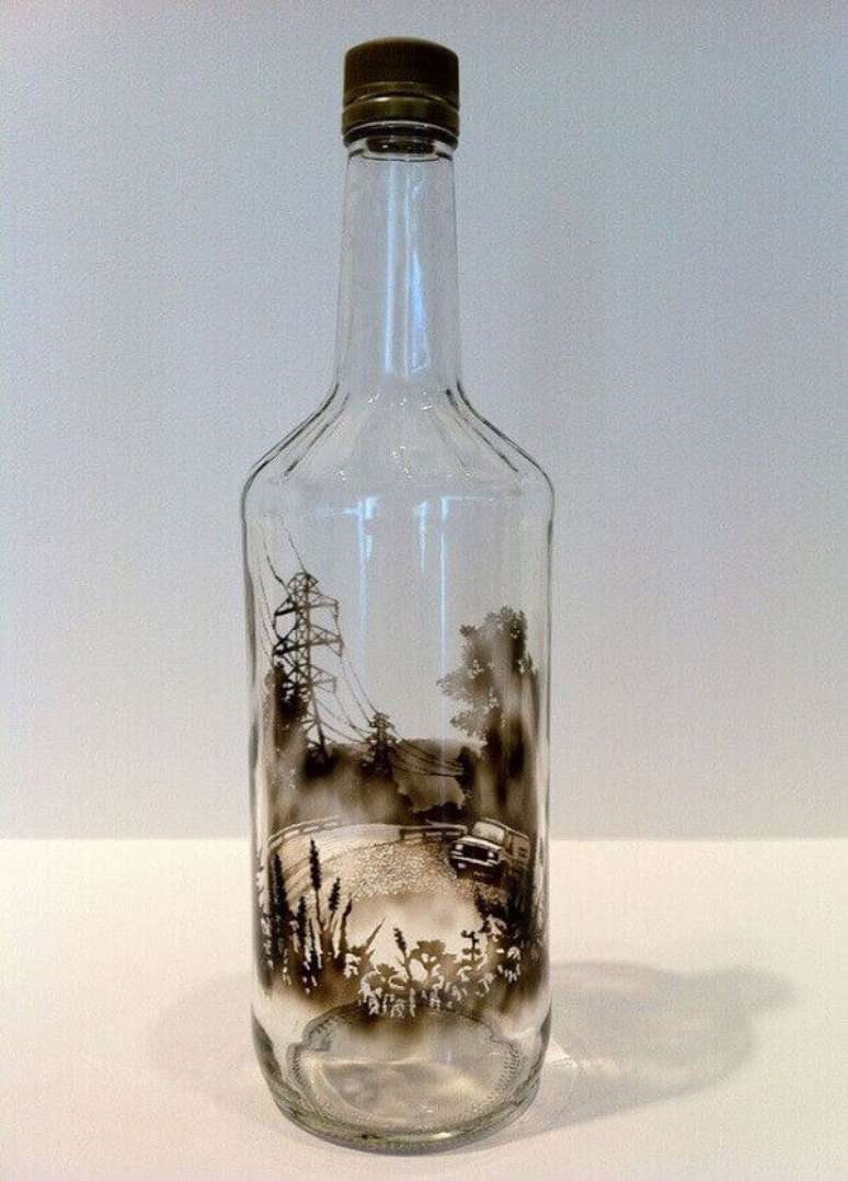 37. Garrafa de vidro decorado com fumaça de vela. Fonte: Pinterest
