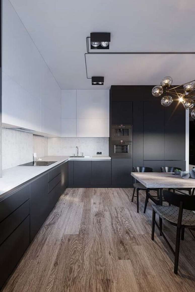 62. O arm&aacute;rio de cozinha preto deixa o ambiente mais luxuoso. Foto: Viva Decora