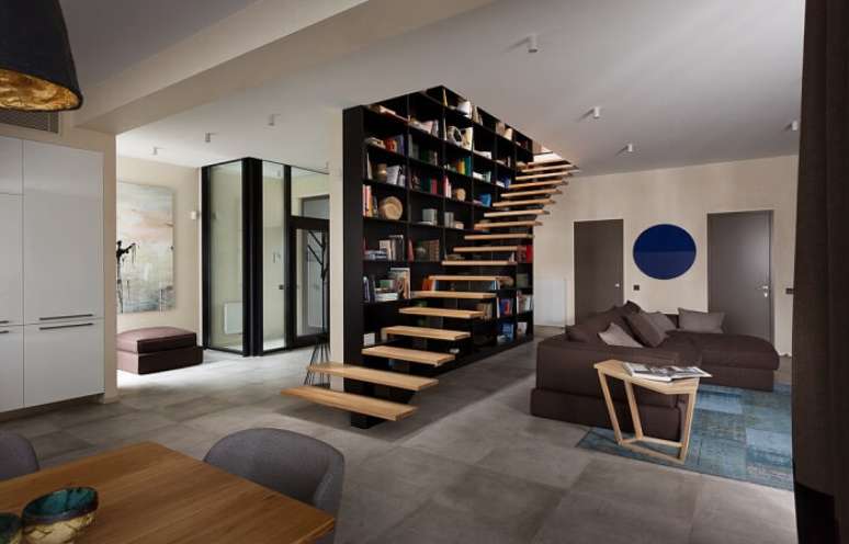 4. Posicione a escada flutuante de madeira no centro de casa. Fonte: All Architecture Designs
