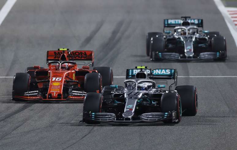 Formula One F1 - Bahrain Grand Prix - Bahrain International Circuit, Sakhir, Bahrain - March 31, 2019  Mercedes' Valtteri Bottas, Ferrari's Charles Leclerc and Mercedes' Lewis Hamilton during the race  REUTERS/Hamad I Mohammed