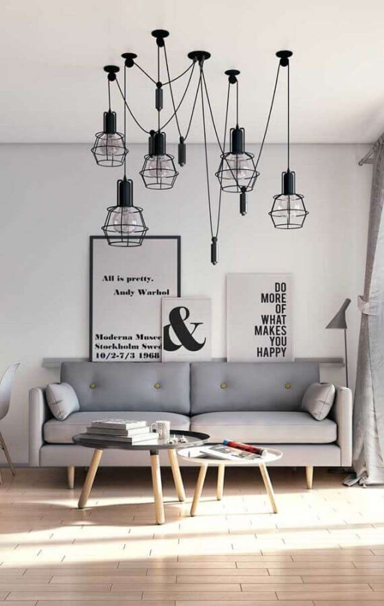 30. Decoração para sala minimalista com pendentes modernos e quadros tumblr de frases – Foto: Chateau de Conques