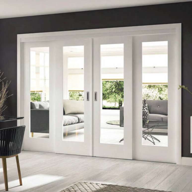 19. A porta balc&atilde;o pode dar destaque ao ambiente. Foto: Homestre