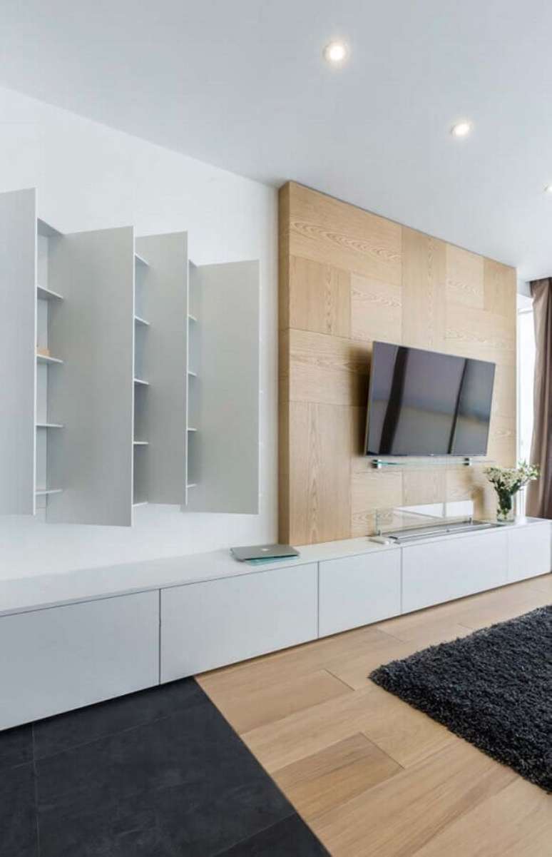 49. Painel com rack para decoração de sala moderna – Foto: Pinterest