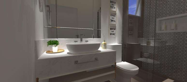 49. Os armários de banheiro planejados podem ganhar iluminação diferente para um efeito interessante. Projeto por Raquel Venezian