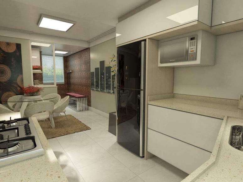 6. O micro-ondas espelhado costuma ser colocado em um nicho. Projeto de Ednilson Hinckel