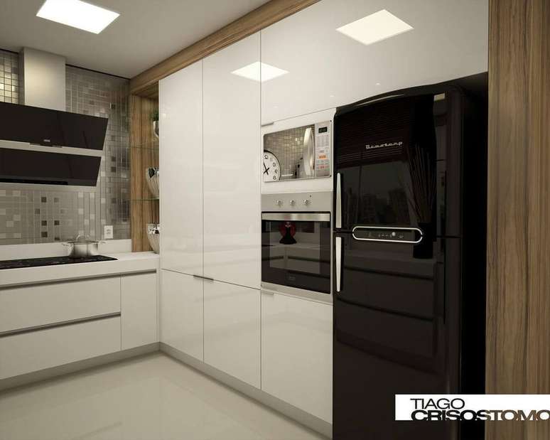 36. O micro-ondas espelhado associado ao porcelanato l&iacute;quido deixa o ambiente muito luminoso. Projeto de Tiago Cris&oacute;stomo de Castro