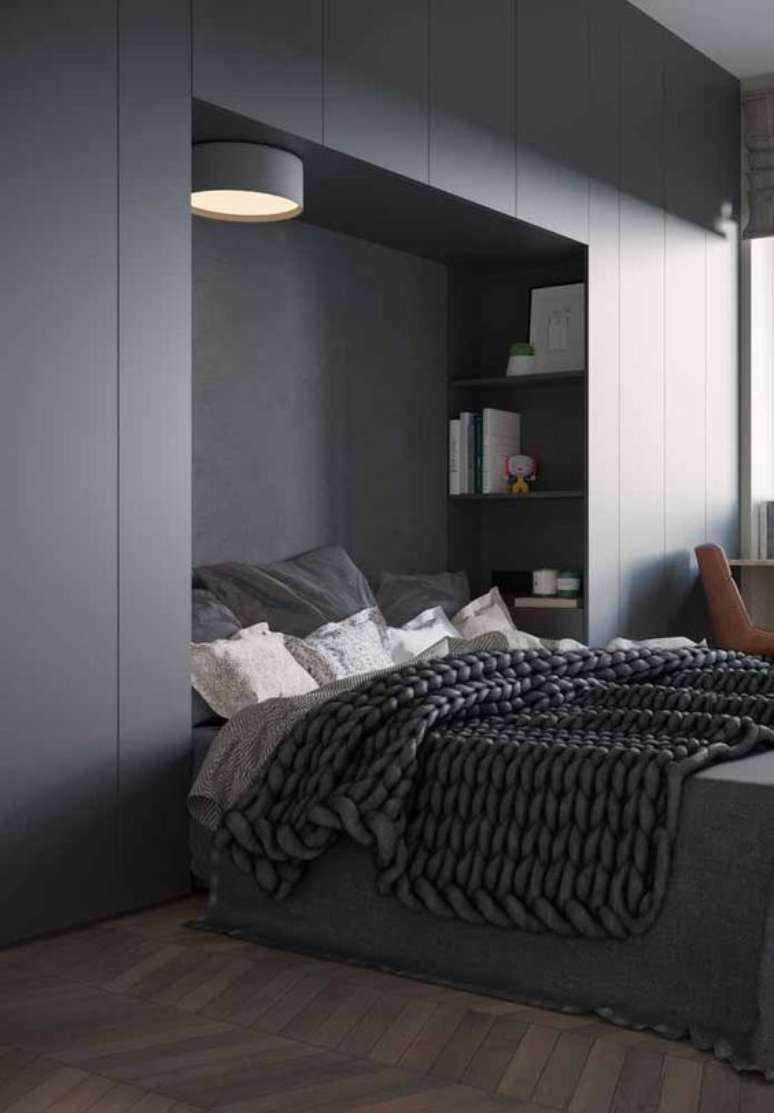 77. O guarda-roupa planejado que possui espa&ccedil;o para cama &eacute; muito interessante. Foto: Ideias Decor