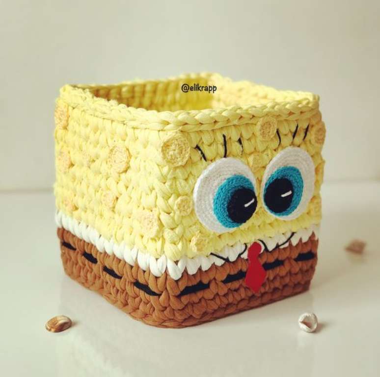 52. A delicadeza do cesto de crochê está na proposta que ele possui. Foto: Instagram