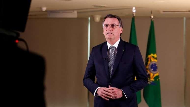 Bolsonaro gravando o pronunciamento que foi ao ar na noite desta sexta-feira (23)