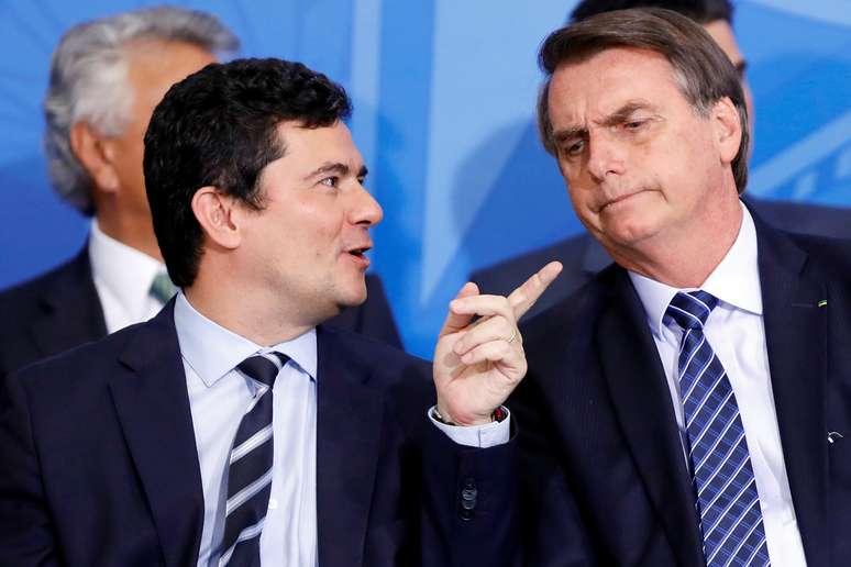 Presidente Jair Bolsonaro e ministro Sergio Moro durante cerimônia no Palácio do Planalto
29/08/2019
REUTERS/Adriano Machado