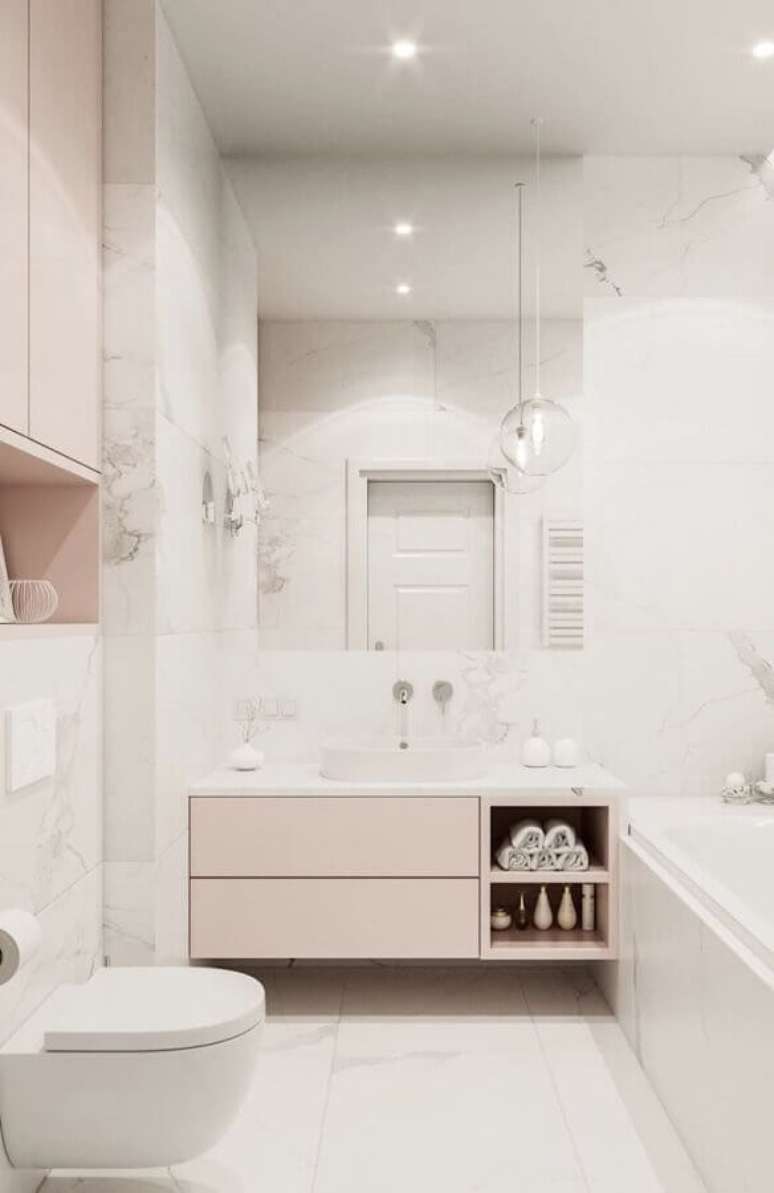 34. Delicada decoração para banheiro feminino branco e rosa pastel – Foto: Eduardo Cavalcanti Castro