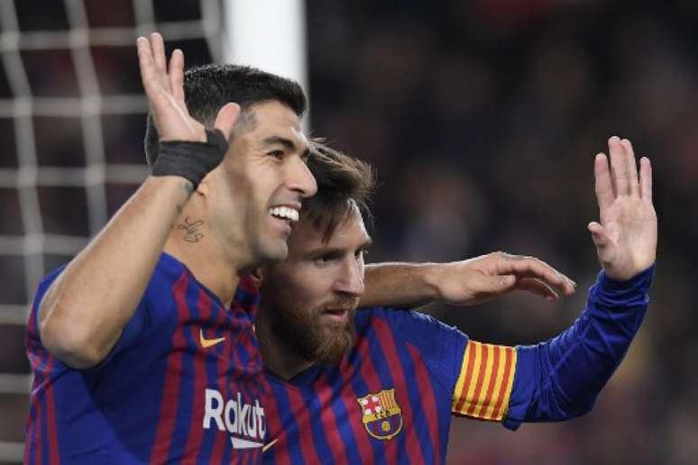 Suárez e Messi tem contrato com o Barcelona até junho de 2021 (Foto: Lluis Gene/AFP)