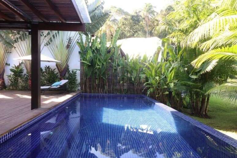 38. Casas com piscina com borda infinita. Fonte: RAWI Arquiteura + Interiores