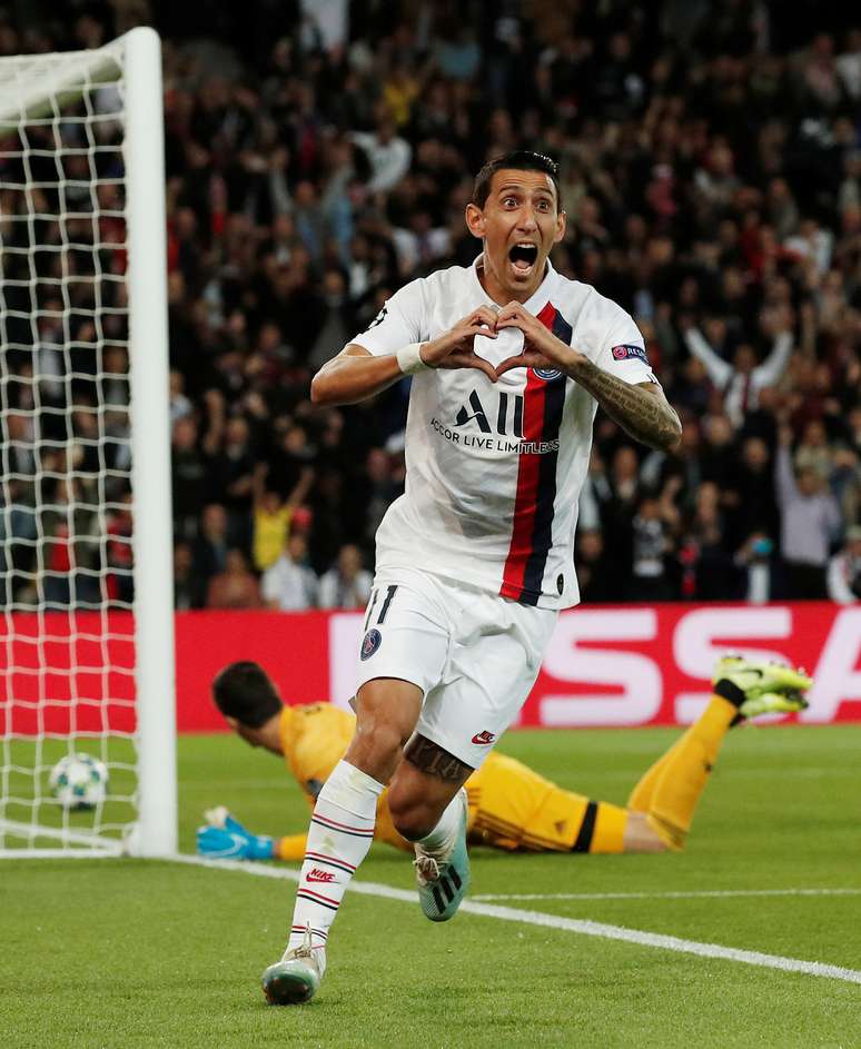 Angel Di Maria comemora o primeiro de seus dois gols, na vit&oacute;ria do PSG sobre o Real Madrid, por 3 X 0, no jogo de abertura do Grupo A da Liga dos Campe&otilde;es da Europa, no jogo realizado em Paris. 18/9/2019  REUTERS/Benoit Tessier 