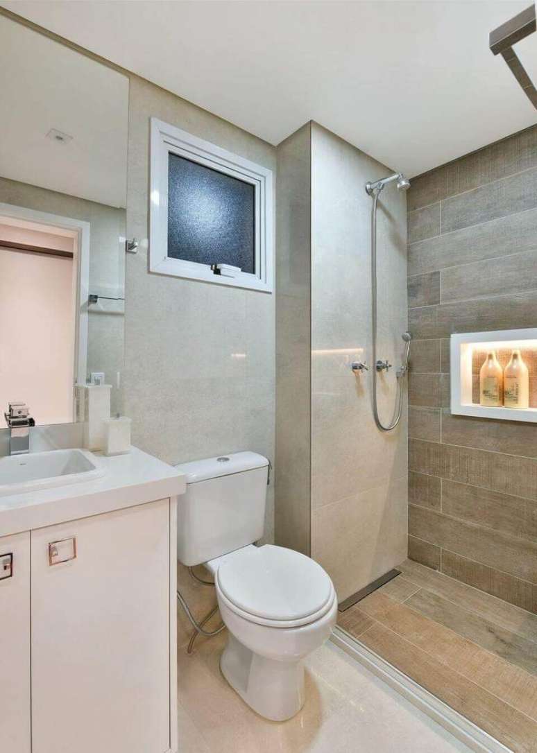 15. Banheiros são ótimos para ter esquadrias de alumínio. Projeto de Tetriz Arquitetura Interiores