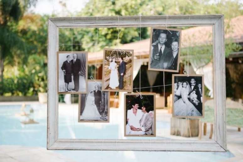 33. Painel de fotos na festa de casamento &ndash; Por: Pinterest