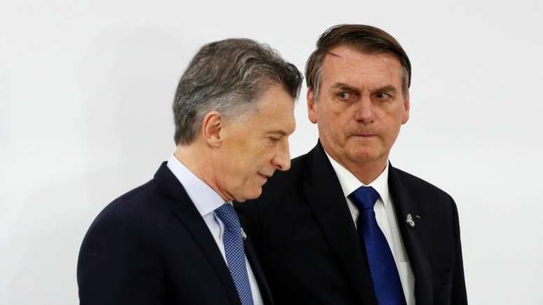 Macri e Bolsonaro, durante cúpula do G20 em junho; pesquisas de opinião mais recentes apontam vantagem da oposição argentina na eleição de outubro
