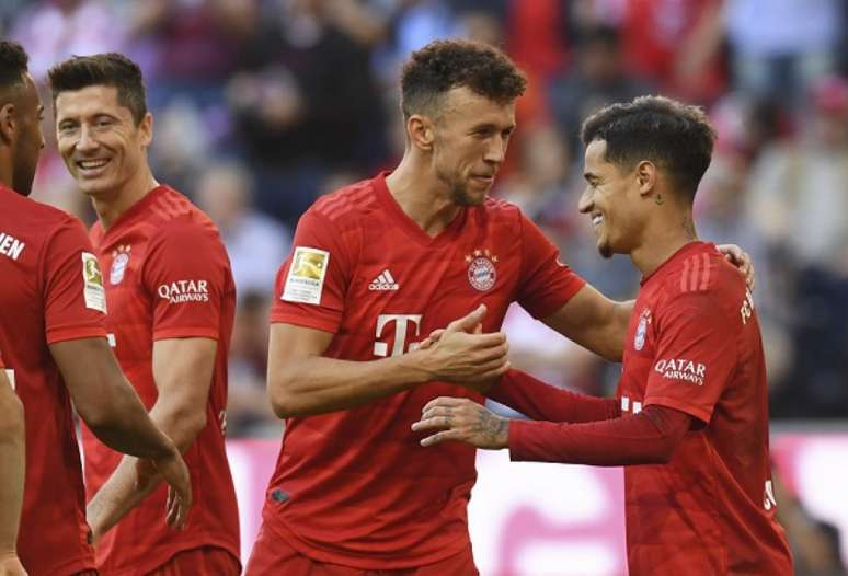 Coutinho e Lewandowski foram os destaques da partida (Foto: AFP)