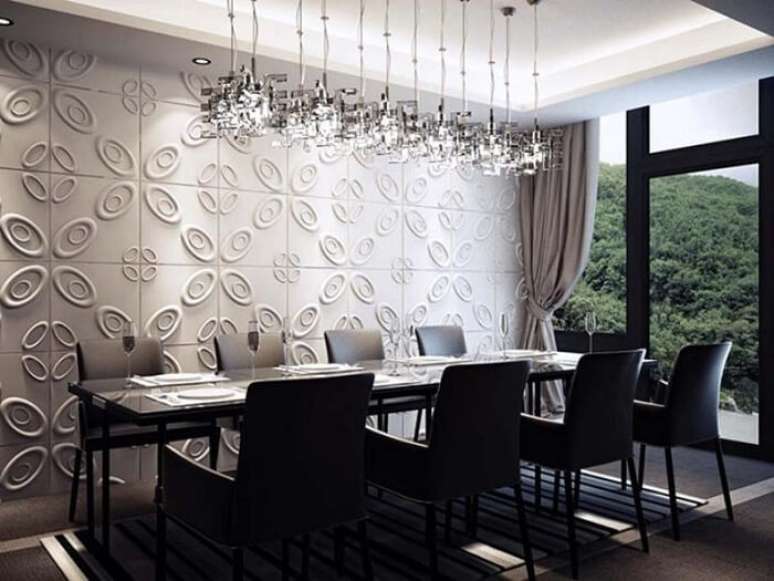 77. Sala de jantar com parede feita em placa de gesso 3D. Fonte: Pinterest