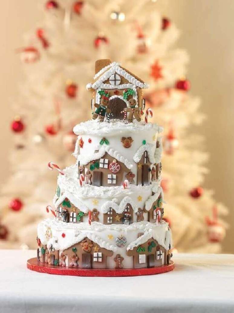 15. Linda inspiração de bolo de Natal decorado com pasta americana imitando casinha de biscoito – Foto: CakesDecor